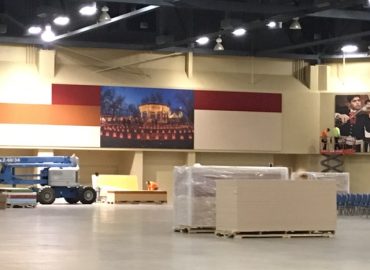 Horizontal acoustic wall treatment and photo graphics during installation.
